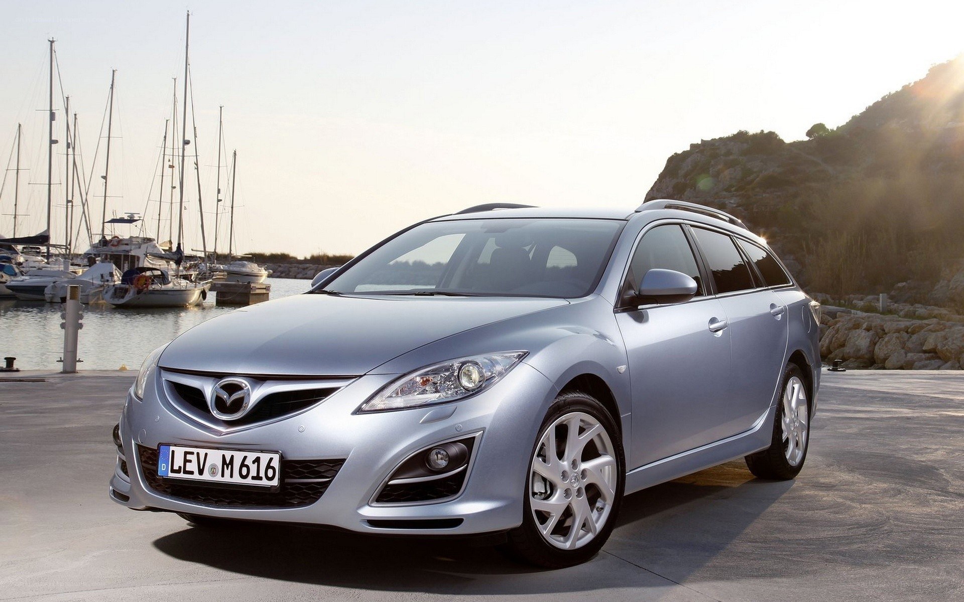 Silver Mazda 6 Wagon by the harbor