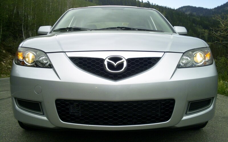 silver mazda car front view