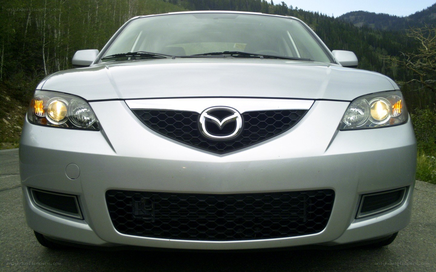 silver mazda car front view