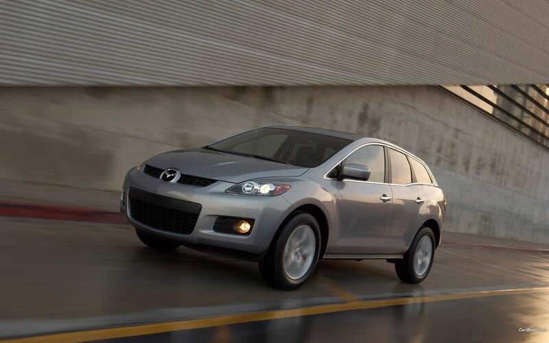 silver mazda cx-7 in motion