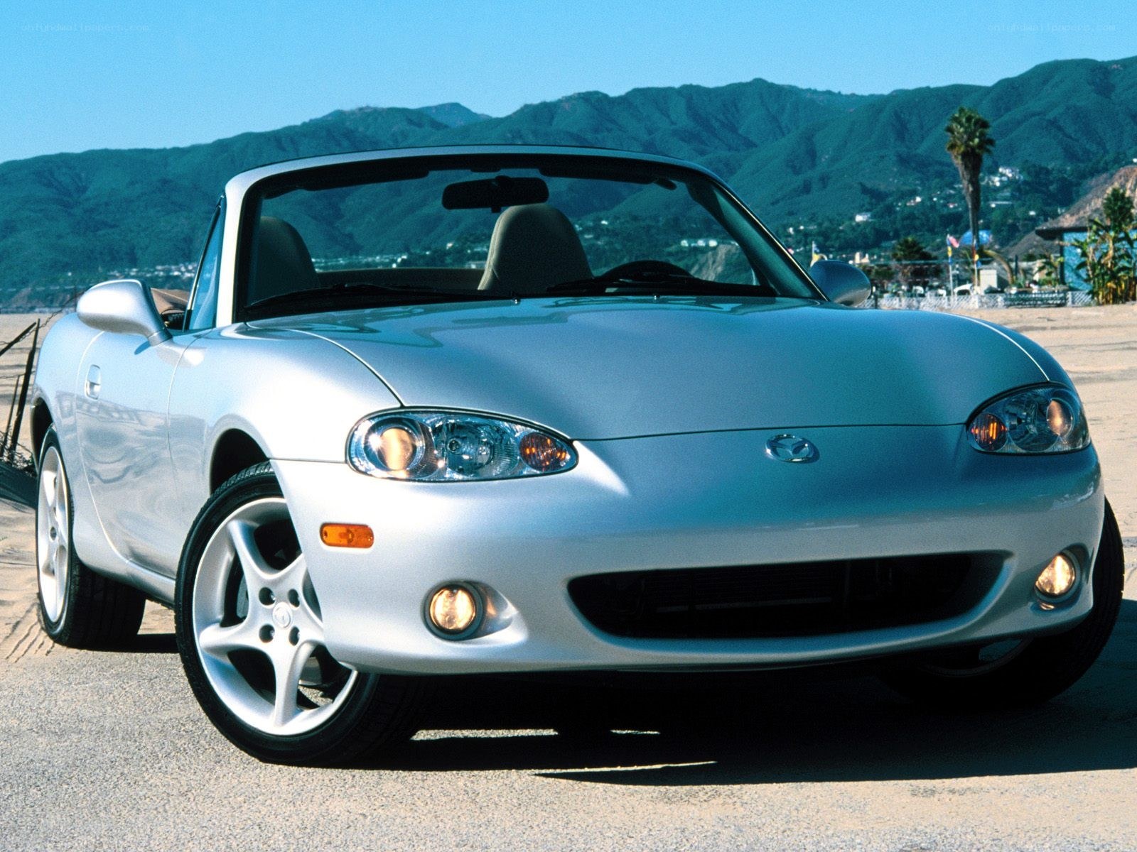 Silver Mazda Miata convertible