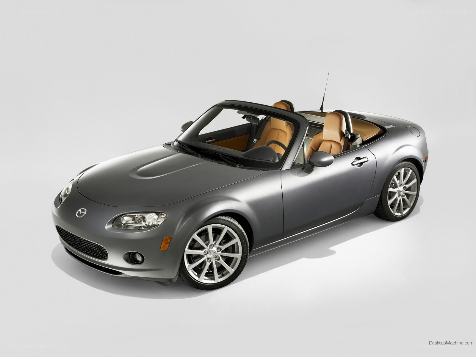 silver mazda miata convertible