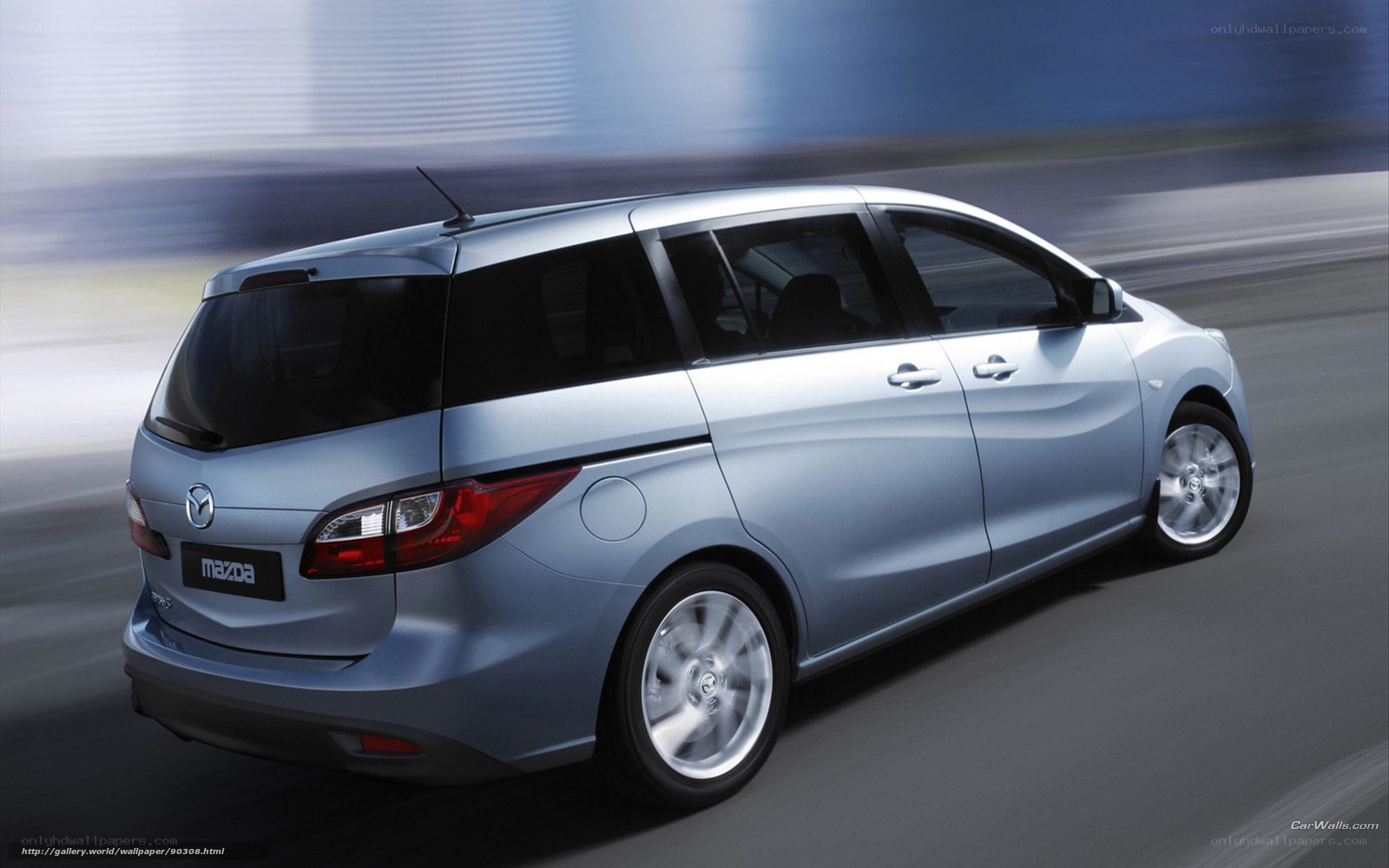 silver mazda mpv in motion