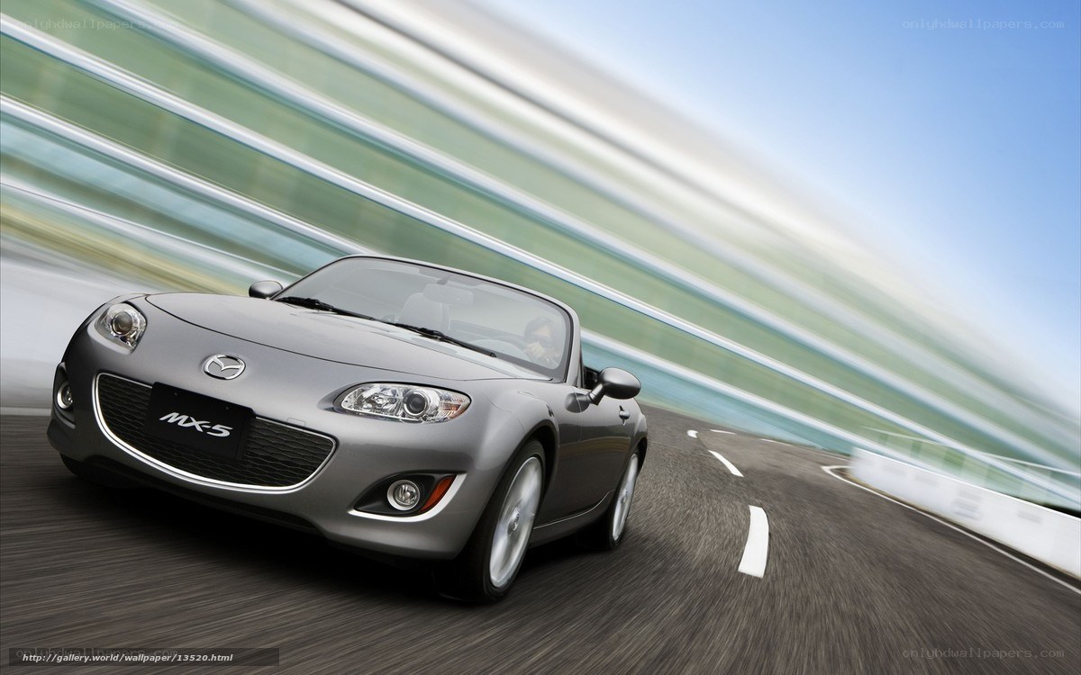 Silver Mazda MX-5 in motion