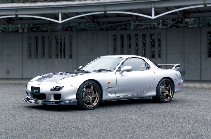 Silver Mazda RX-7 sports car