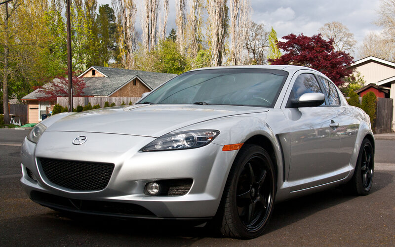 Silver Mazda RX-8 parked on street