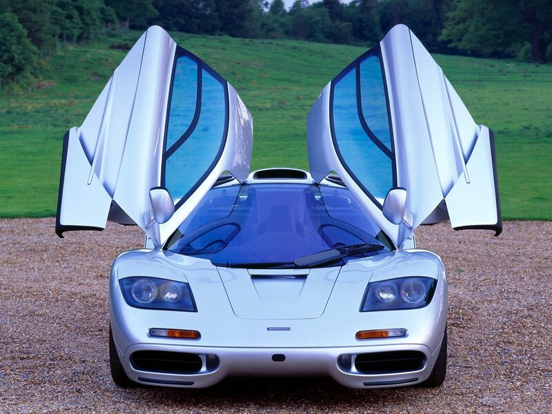 Silver McLaren F1 with doors open