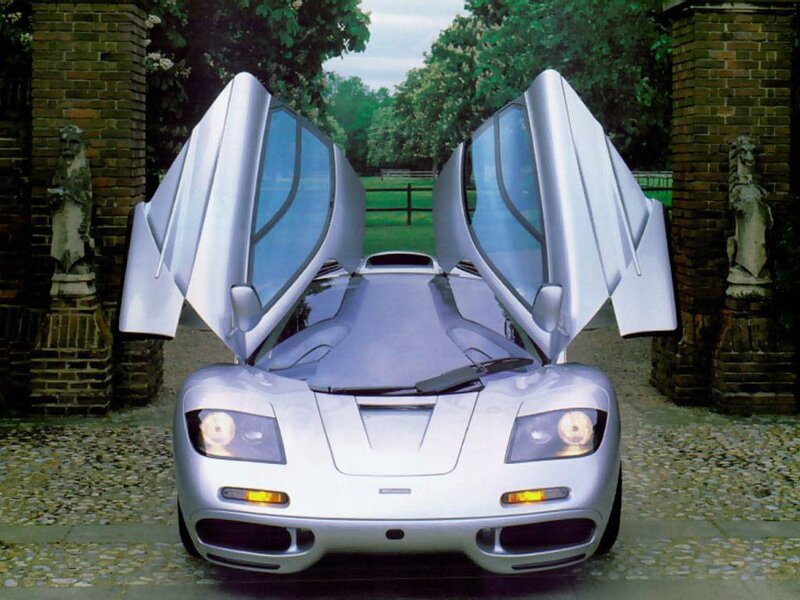 Silver McLaren F1 with doors open