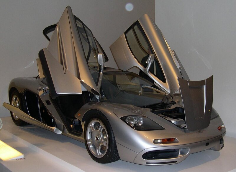 Silver McLaren F1 with doors open