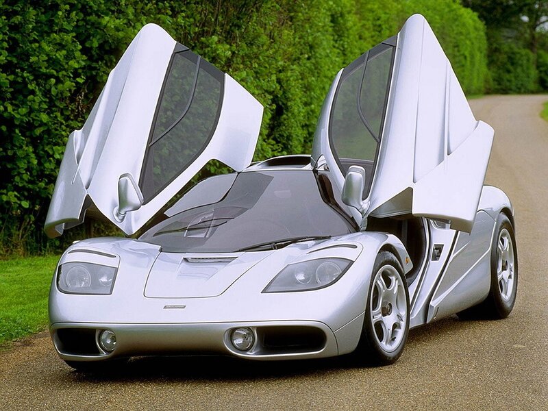 Silver McLaren F1 with doors open