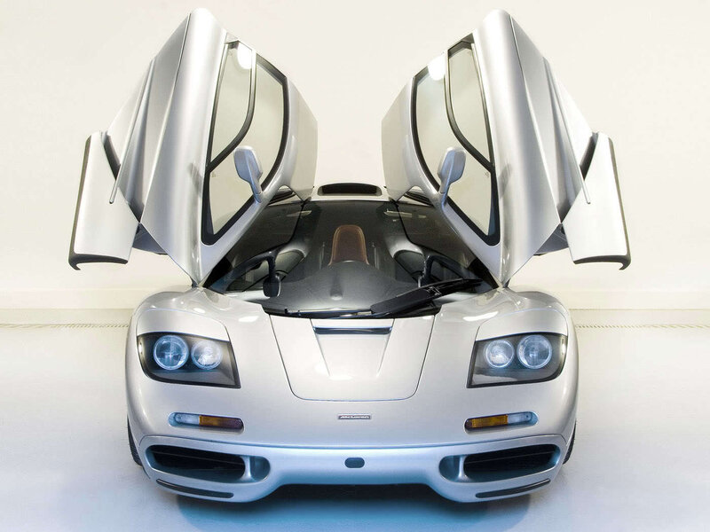 Silver McLaren F1 with doors open