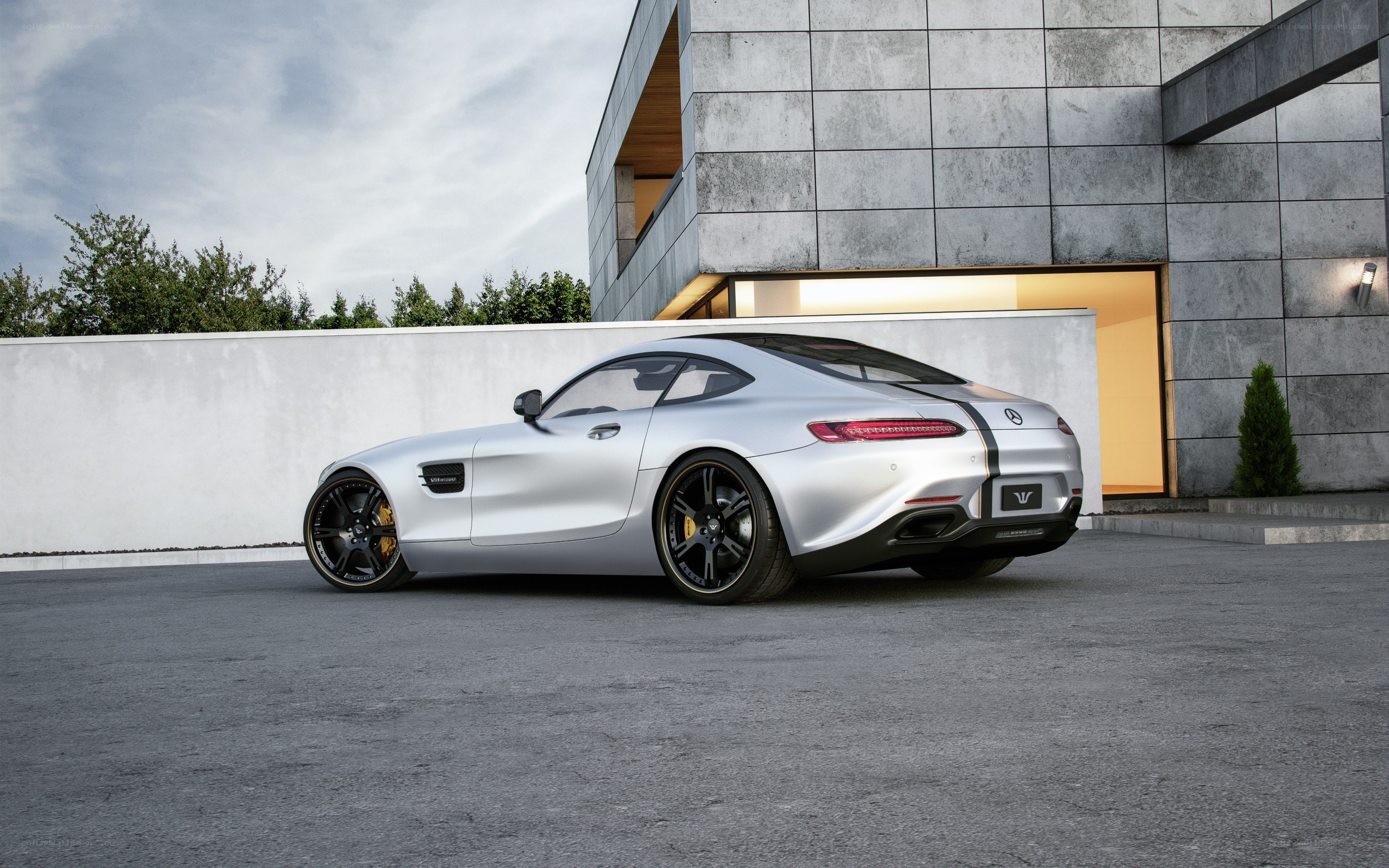 Silver Mercedes-AMG GT parked outside