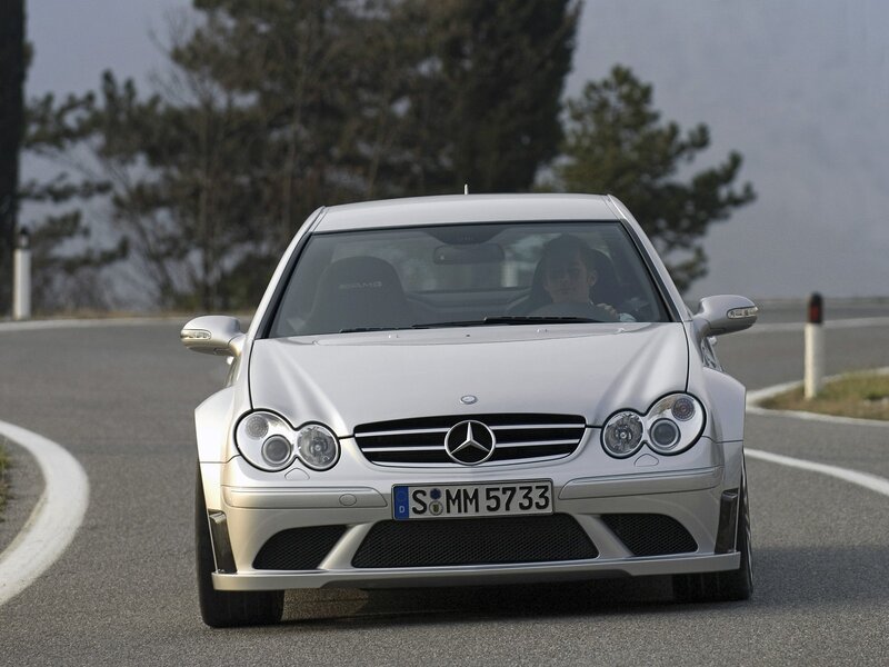 silver mercedes-amg on winding road