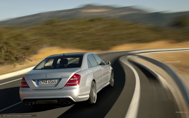 silver mercedes-amg on winding road