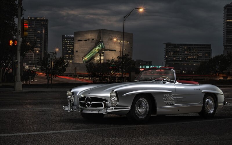 Silver Mercedes-Benz 300SL on city street