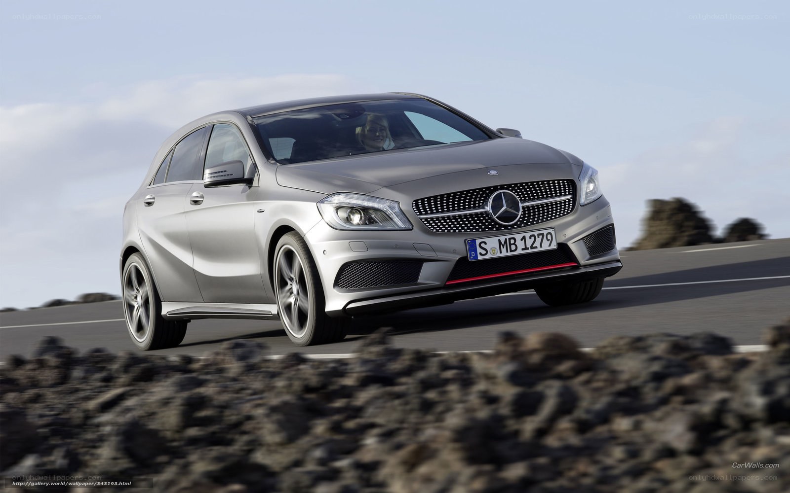 silver mercedes-benz a-class driving