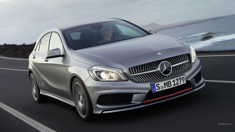 silver mercedes-benz a45 driving on coast