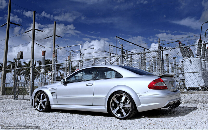 Silver Mercedes-Benz at power station
