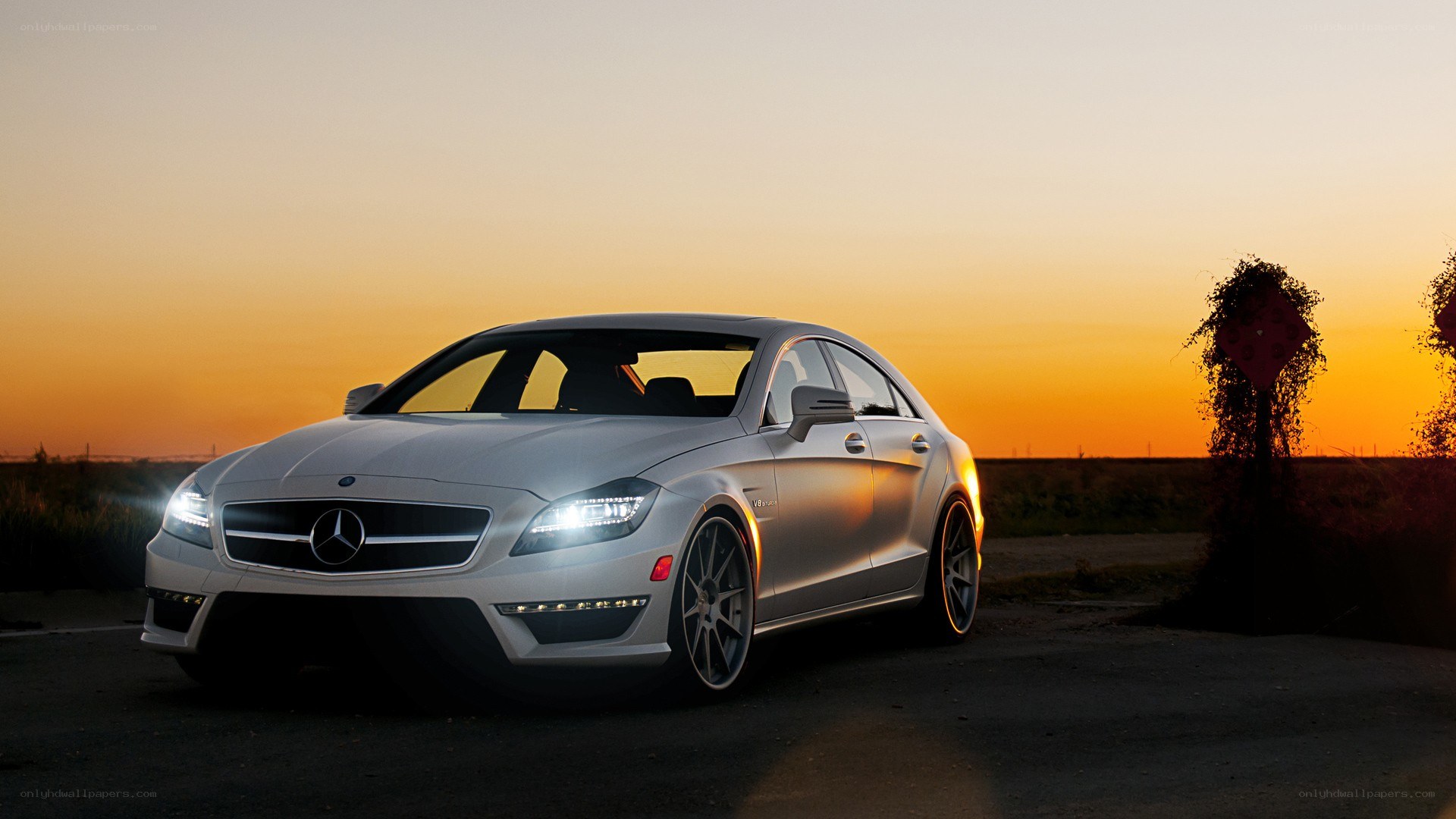 silver mercedes-benz at sunset