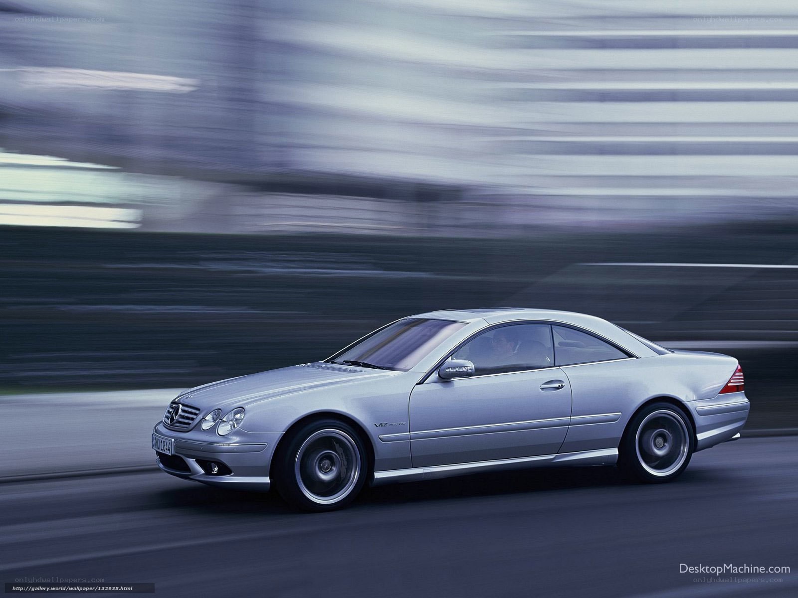 silver mercedes-benz cl55 amg in motion