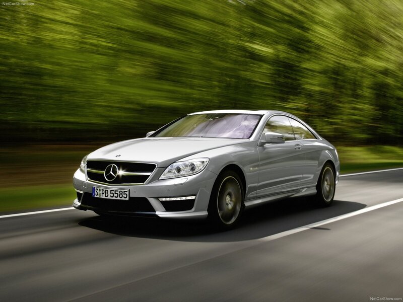 silver mercedes-benz cl63 amg in motion