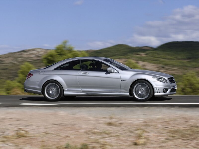 silver mercedes-benz cl63 amg in motion