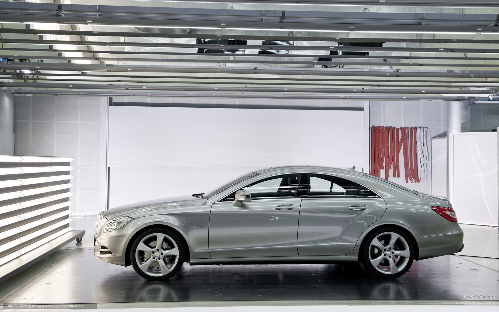 silver mercedes-benz cls in showroom