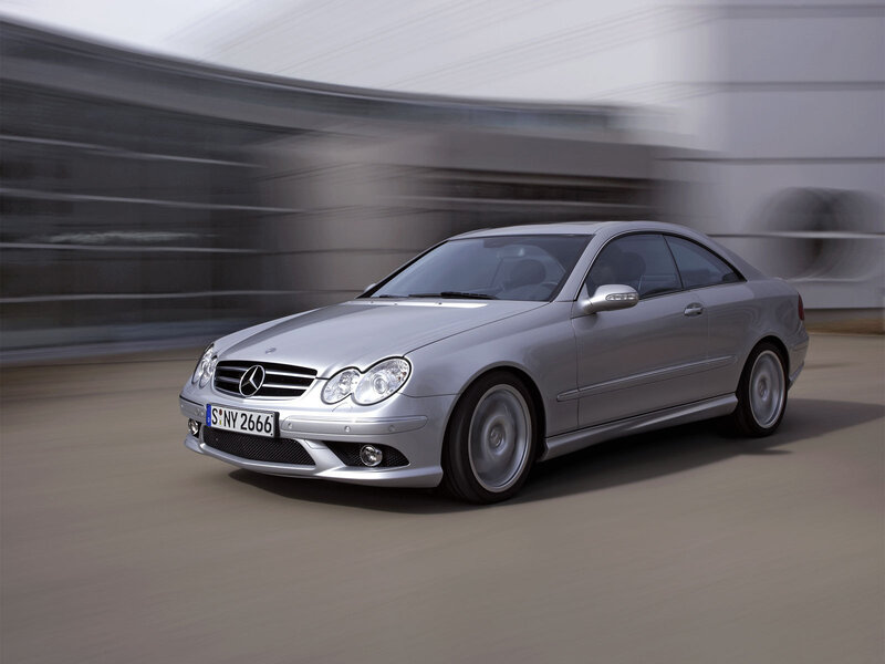 silver mercedes-benz coupe in motion