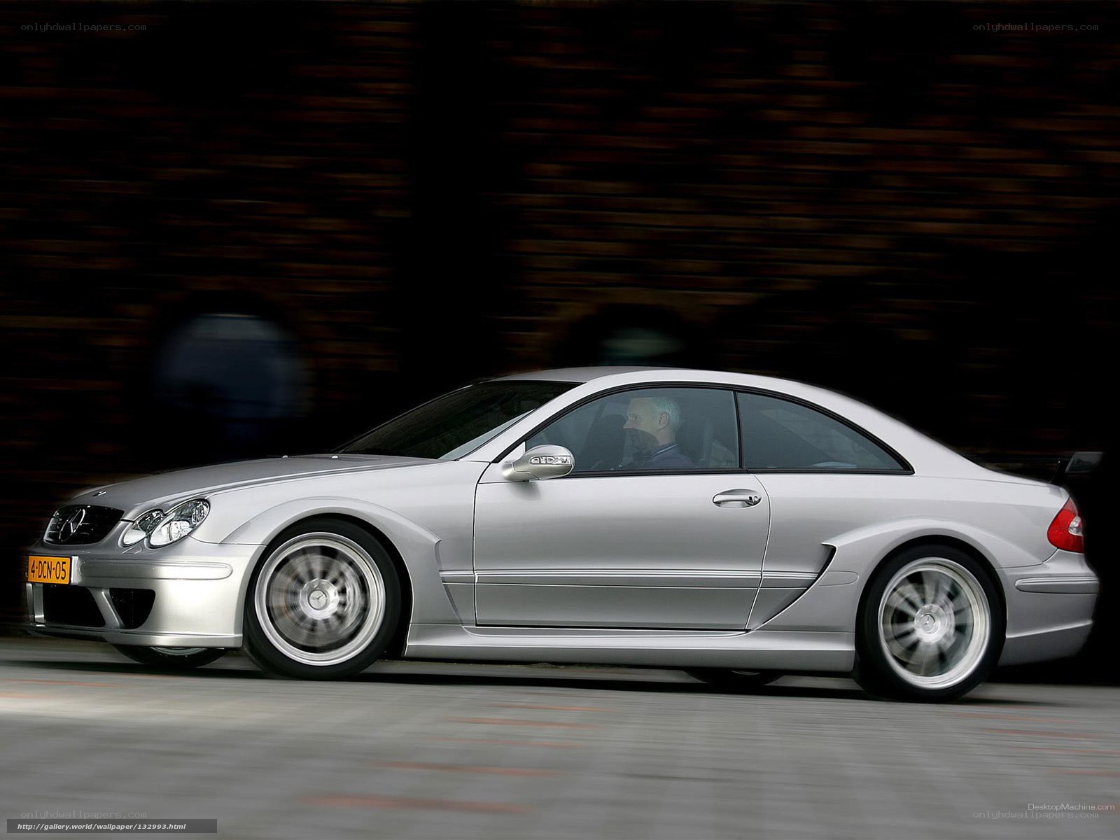 silver mercedes-benz coupe in motion