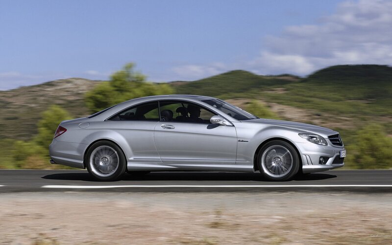 silver mercedes-benz coupe on road