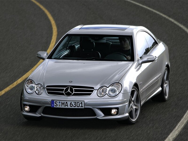 silver mercedes-benz coupe on road