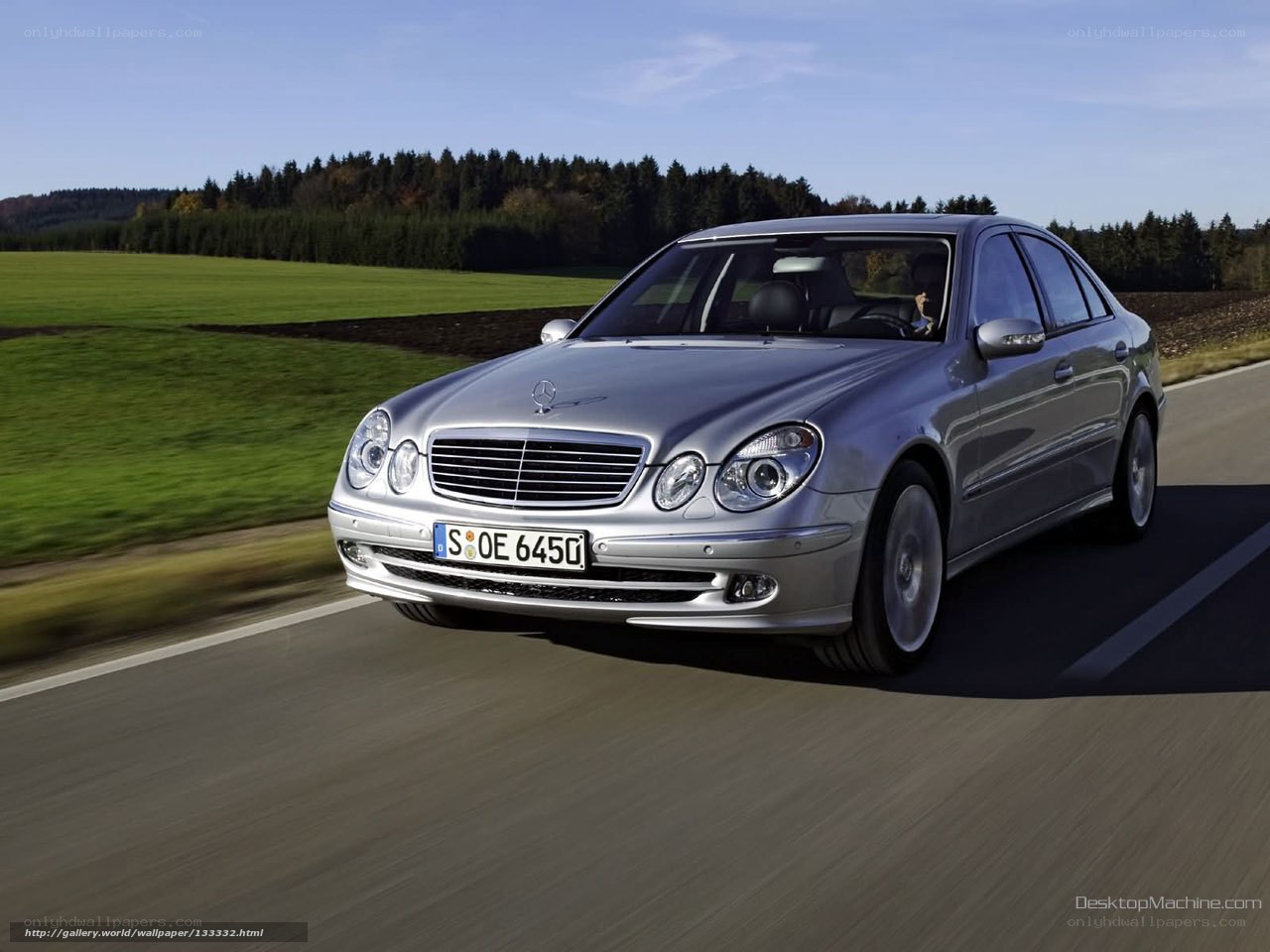 silver mercedes-benz driving on road