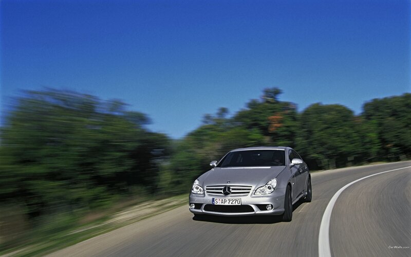 silver mercedes-benz driving on road