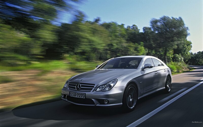 silver mercedes-benz driving on road