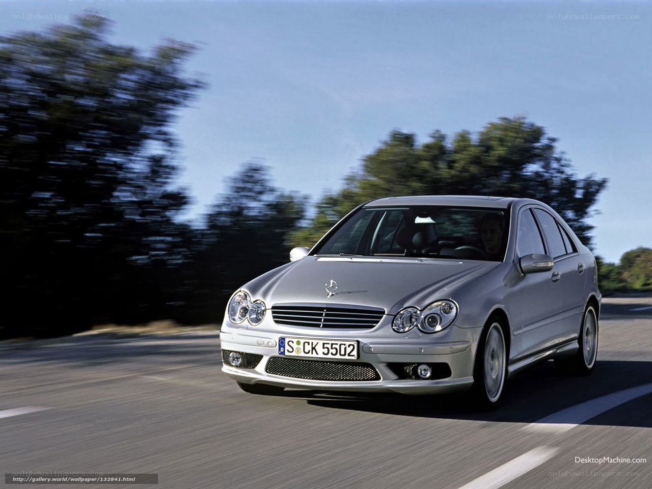 silver mercedes-benz driving on road