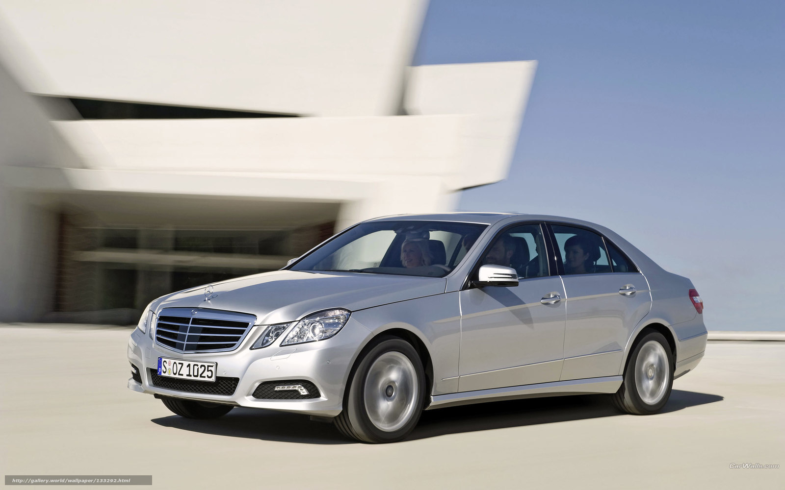 Silver Mercedes-Benz E-Class in motion