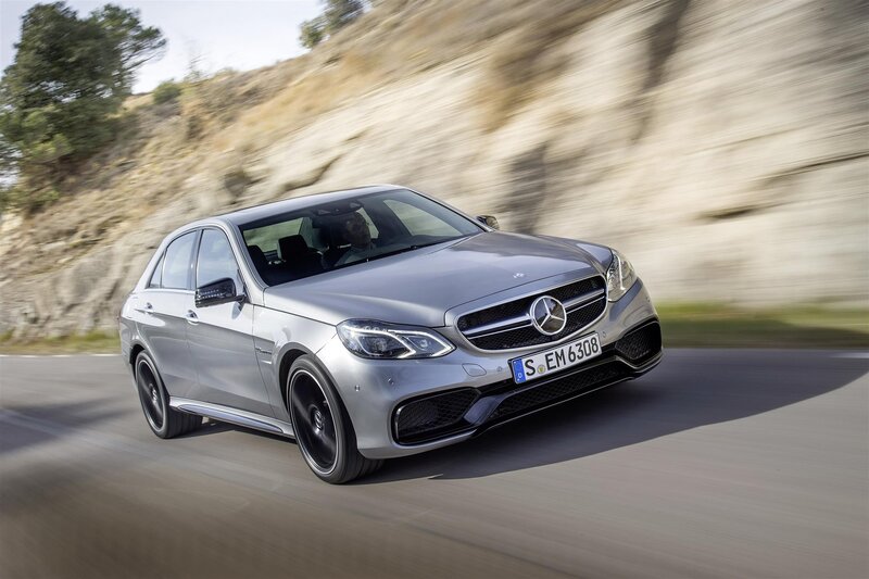 Silver Mercedes-Benz E63 AMG driving