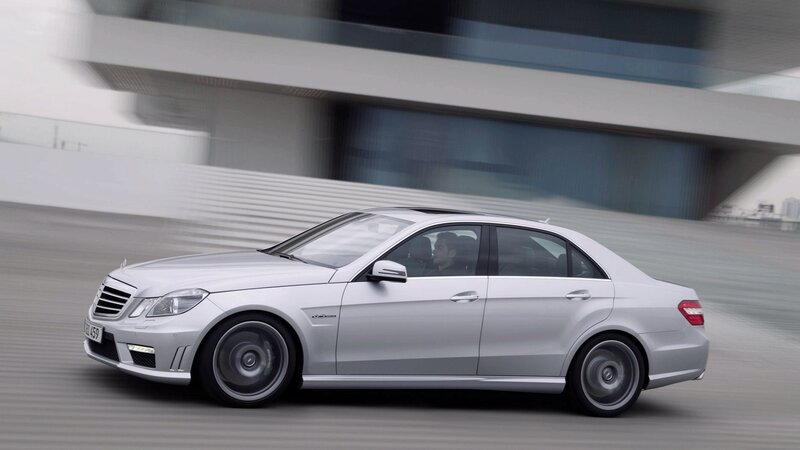 silver mercedes-benz e63 amg in motion