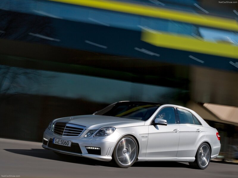 silver mercedes-benz e63 amg in motion