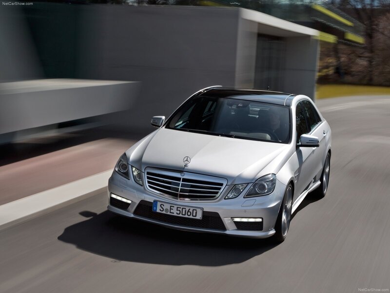 silver mercedes-benz e63 amg in motion