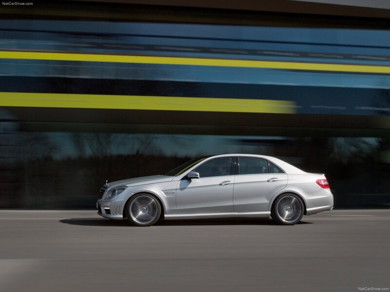 silver mercedes-benz e63 amg in motion