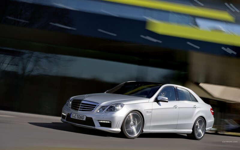 silver mercedes-benz e63 amg in motion