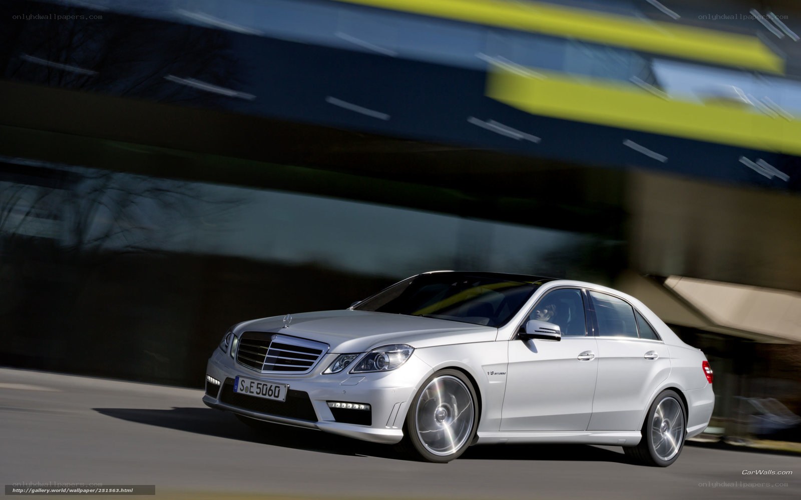 silver mercedes-benz e63 amg in motion