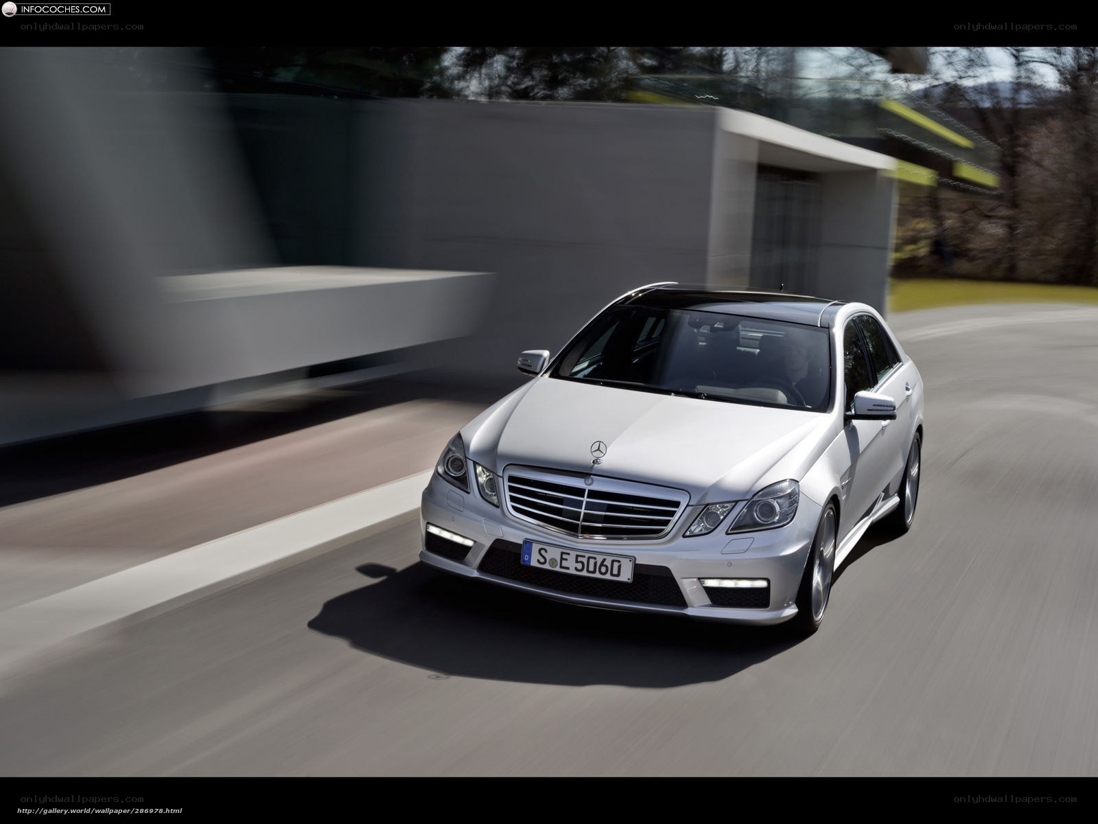 silver mercedes-benz e63 amg in motion
