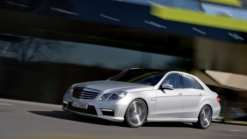 silver mercedes-benz e63 amg in motion