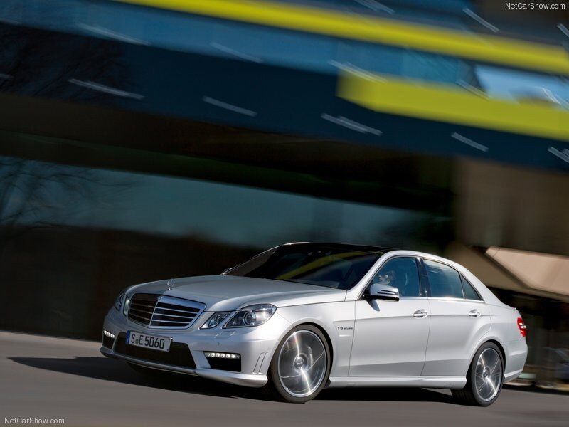silver mercedes-benz e63 amg in motion