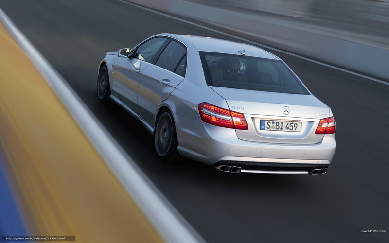 silver mercedes-benz e63 amg in motion