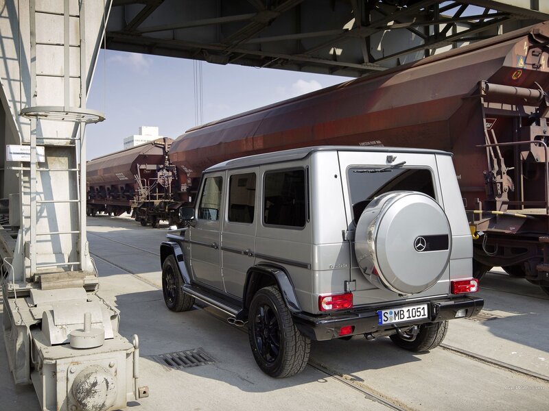 Silver Mercedes-Benz G-Class at train yard
