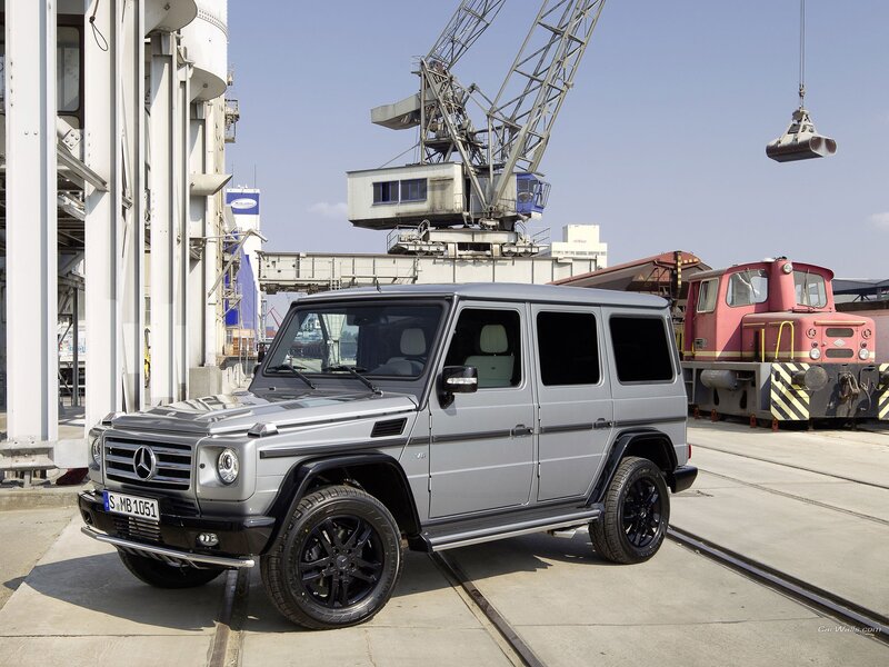 Silver Mercedes-Benz G-Class in industrial setting