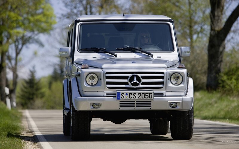 silver mercedes-benz g-class on road
